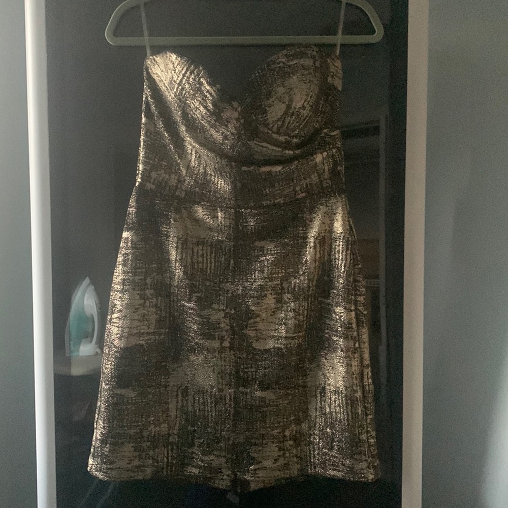Sexy black and gold metallic mini dress
